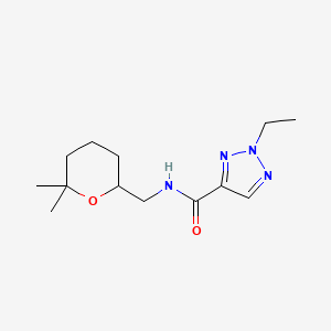 molecular formula C13H22N4O2 B7296780 N-[(6,6-dimethyloxan-2-yl)methyl]-2-ethyltriazole-4-carboxamide 