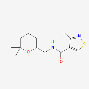 molecular formula C13H20N2O2S B7296795 N-[(6,6-dimethyloxan-2-yl)methyl]-3-methyl-1,2-thiazole-4-carboxamide 