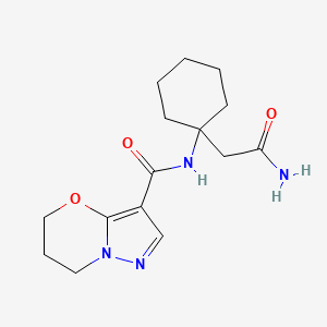 molecular formula C15H22N4O3 B7297860 N-[1-(2-amino-2-oxoethyl)cyclohexyl]-6,7-dihydro-5H-pyrazolo[5,1-b][1,3]oxazine-3-carboxamide 