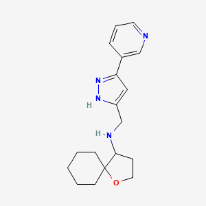 molecular formula C18H24N4O B7299782 N-[(3-pyridin-3-yl-1H-pyrazol-5-yl)methyl]-1-oxaspiro[4.5]decan-4-amine 