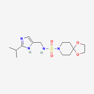 molecular formula C14H24N4O4S B7304033 N-[(2-propan-2-yl-1H-imidazol-5-yl)methyl]-1,4-dioxa-8-azaspiro[4.5]decane-8-sulfonamide 