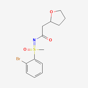molecular formula C13H16BrNO3S B7307947 N-[(2-bromophenyl)-methyl-oxo-lambda6-sulfanylidene]-2-(oxolan-2-yl)acetamide 