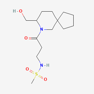molecular formula C14H26N2O4S B7310246 N-[3-[8-(hydroxymethyl)-7-azaspiro[4.5]decan-7-yl]-3-oxopropyl]methanesulfonamide 