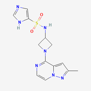 molecular formula C13H15N7O2S B7310778 N-[1-(2-methylpyrazolo[1,5-a]pyrazin-4-yl)azetidin-3-yl]-1H-imidazole-5-sulfonamide 