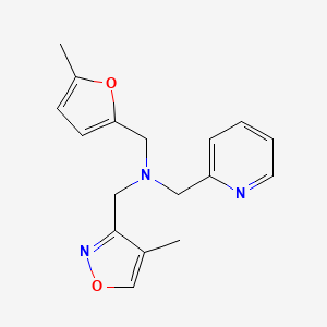 molecular formula C17H19N3O2 B7313947 N-[(5-methylfuran-2-yl)methyl]-N-[(4-methyl-1,2-oxazol-3-yl)methyl]-1-pyridin-2-ylmethanamine 