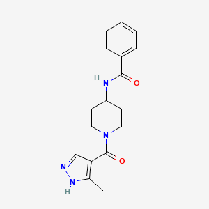 molecular formula C17H20N4O2 B7318964 N-[1-(5-methyl-1H-pyrazole-4-carbonyl)piperidin-4-yl]benzamide 