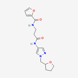 molecular formula C16H20N4O4 B7323328 N-[3-oxo-3-[[1-(oxolan-2-ylmethyl)pyrazol-4-yl]amino]propyl]furan-2-carboxamide 
