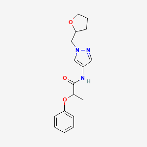 molecular formula C17H21N3O3 B7323372 N-[1-(oxolan-2-ylmethyl)pyrazol-4-yl]-2-phenoxypropanamide 