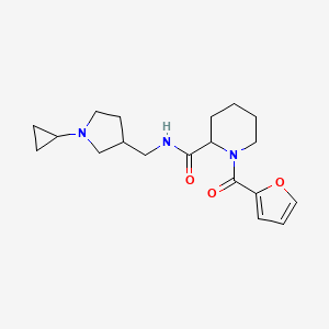 molecular formula C19H27N3O3 B7324654 N-[(1-cyclopropylpyrrolidin-3-yl)methyl]-1-(furan-2-carbonyl)piperidine-2-carboxamide 