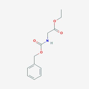 molecular formula C12H15NO4 B073256 N-Cbz-glycine Ethyl Ester CAS No. 1145-81-9