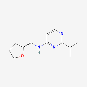 molecular formula C12H19N3O B7336691 N-[[(2R)-oxolan-2-yl]methyl]-2-propan-2-ylpyrimidin-4-amine 