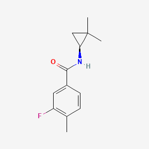 molecular formula C13H16FNO B7337840 N-[(1S)-2,2-dimethylcyclopropyl]-3-fluoro-4-methylbenzamide 