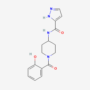 molecular formula C16H18N4O3 B7359747 N-[1-(2-hydroxybenzoyl)piperidin-4-yl]-1H-pyrazole-5-carboxamide 