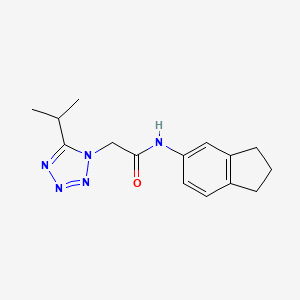 molecular formula C15H19N5O B7367549 N-(2,3-dihydro-1H-inden-5-yl)-2-(5-propan-2-yltetrazol-1-yl)acetamide 