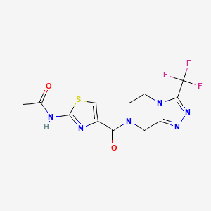 molecular formula C12H11F3N6O2S B7372217 N-[4-[3-(trifluoromethyl)-6,8-dihydro-5H-[1,2,4]triazolo[4,3-a]pyrazine-7-carbonyl]-1,3-thiazol-2-yl]acetamide 