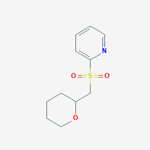 molecular formula C11H15NO3S B7374859 2-(Oxan-2-ylmethylsulfonyl)pyridine 