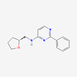 molecular formula C15H17N3O B7378361 N-[[(2R)-oxolan-2-yl]methyl]-2-phenylpyrimidin-4-amine 
