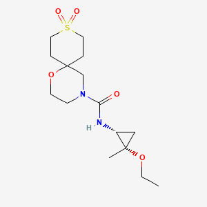 molecular formula C15H26N2O5S B7385423 N-[(1R,2S)-2-ethoxy-2-methylcyclopropyl]-9,9-dioxo-1-oxa-9lambda6-thia-4-azaspiro[5.5]undecane-4-carboxamide 