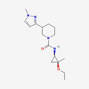 molecular formula C16H26N4O2 B7385462 N-[(1R,2S)-2-ethoxy-2-methylcyclopropyl]-3-(1-methylpyrazol-3-yl)piperidine-1-carboxamide 