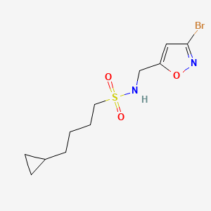 molecular formula C11H17BrN2O3S B7385855 N-[(3-bromo-1,2-oxazol-5-yl)methyl]-4-cyclopropylbutane-1-sulfonamide 