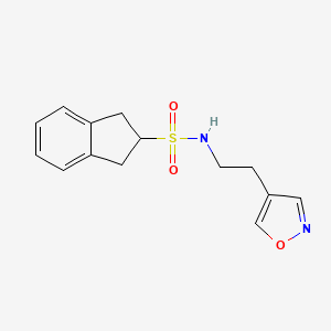 molecular formula C14H16N2O3S B7386940 N-[2-(1,2-oxazol-4-yl)ethyl]-2,3-dihydro-1H-indene-2-sulfonamide 