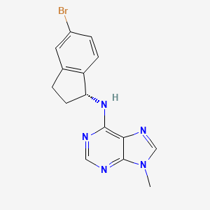 molecular formula C15H14BrN5 B7396403 N-[(1R)-5-bromo-2,3-dihydro-1H-inden-1-yl]-9-methylpurin-6-amine 