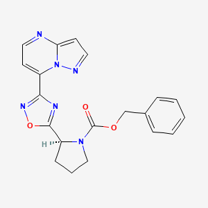molecular formula C20H18N6O3 B7404513 benzyl (2S)-2-(3-pyrazolo[1,5-a]pyrimidin-7-yl-1,2,4-oxadiazol-5-yl)pyrrolidine-1-carboxylate 