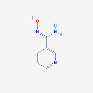 molecular formula C6H7N3O B074858 N'-hydroxypyridine-3-carboximidamide CAS No. 1594-58-7