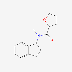 molecular formula C15H19NO2 B7488866 N-(2,3-dihydro-1H-inden-1-yl)-N-methyloxolane-2-carboxamide 
