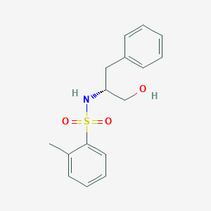 molecular formula C16H19NO3S B7498561 N-[(2R)-1-hydroxy-3-phenylpropan-2-yl]-2-methylbenzenesulfonamide 