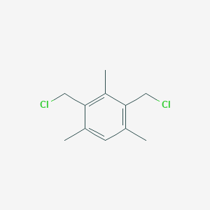 molecular formula C11H14Cl2 B075270 2,4-Bis(chloromethyl)-1,3,5-trimethylbenzene CAS No. 1585-17-7