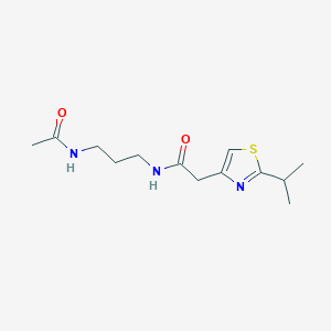 molecular formula C13H21N3O2S B7558892 N-(3-acetamidopropyl)-2-(2-propan-2-yl-1,3-thiazol-4-yl)acetamide 