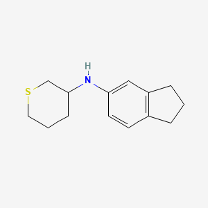 molecular formula C14H19NS B7568358 N-(2,3-dihydro-1H-inden-5-yl)thian-3-amine 