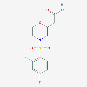 molecular formula C12H13ClFNO5S B7579993 2-[4-(2-Chloro-4-fluorophenyl)sulfonylmorpholin-2-yl]acetic acid 