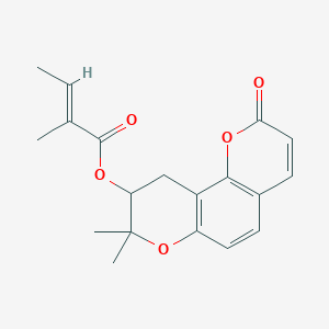 molecular formula C19H20O5 B075805 (8,8-二甲基-2-氧代-9,10-二氢吡喃[2,3-h]色满-9-基) (E)-2-甲基丁-2-烯酸酯 CAS No. 1165-60-2