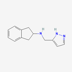 molecular formula C13H15N3 B7587435 N-(1H-pyrazol-5-ylmethyl)-2,3-dihydro-1H-inden-2-amine 