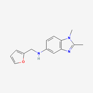 molecular formula C14H15N3O B7595407 N-(furan-2-ylmethyl)-1,2-dimethylbenzimidazol-5-amine 