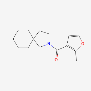 molecular formula C15H21NO2 B7619867 2-Azaspiro[4.5]decan-2-yl-(2-methylfuran-3-yl)methanone 