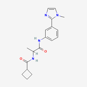 molecular formula C18H22N4O2 B7623568 N-[1-[3-(1-methylimidazol-2-yl)anilino]-1-oxopropan-2-yl]cyclobutanecarboxamide 