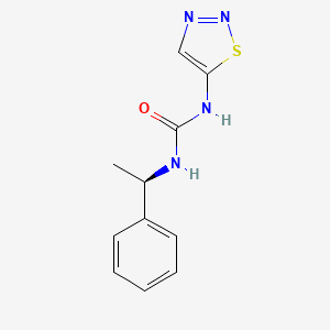 molecular formula C11H12N4OS B7671838 1-[(1R)-1-phenylethyl]-3-(thiadiazol-5-yl)urea 