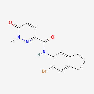 molecular formula C15H14BrN3O2 B7679463 N-(6-bromo-2,3-dihydro-1H-inden-5-yl)-1-methyl-6-oxopyridazine-3-carboxamide 