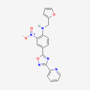 molecular formula C18H13N5O4 B7690288 N-[(Furan-2-YL)methyl]-2-nitro-4-[3-(pyridin-2-YL)-1,2,4-oxadiazol-5-YL]aniline 