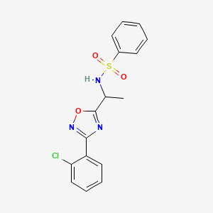 molecular formula C16H14ClN3O3S B7709044 N-(1-(3-(2-chlorophenyl)-1,2,4-oxadiazol-5-yl)ethyl)benzenesulfonamide 
