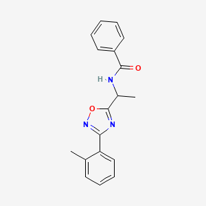 molecular formula C18H17N3O2 B7717208 N-[1-[3-(2-methylphenyl)-1,2,4-oxadiazol-5-yl]ethyl]benzamide 
