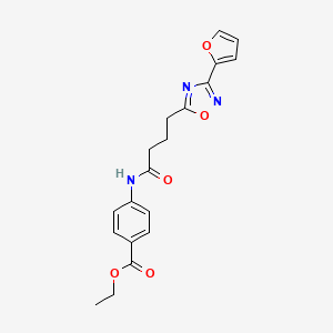 molecular formula C19H19N3O5 B7717892 Ethyl 4-{4-[3-(furan-2-YL)-1,2,4-oxadiazol-5-YL]butanamido}benzoate 
