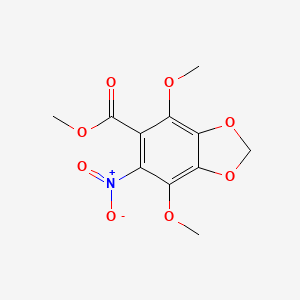 molecular formula C11H11NO8 B7816863 Methyl 4,7-dimethoxy-6-nitro-2H-1,3-benzodioxole-5-carboxylate 