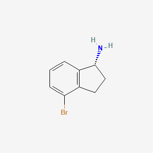 molecular formula C9H10BrN B7856271 (R)-4-bromo-2,3-dihydro-1H-inden-1-amine 