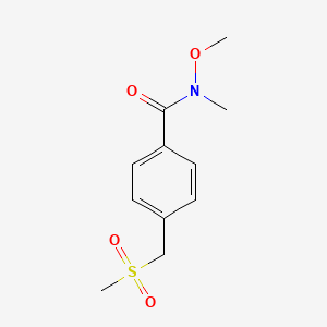 molecular formula C11H15NO4S B7858404 N-methoxy-N-methyl-4-(methylsulfonylmethyl)benzamide 
