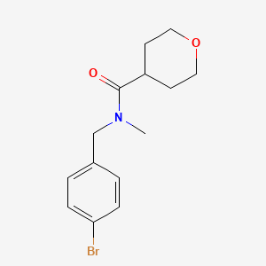 molecular formula C14H18BrNO2 B7858822 N-[(4-bromophenyl)methyl]-N-methyloxane-4-carboxamide 