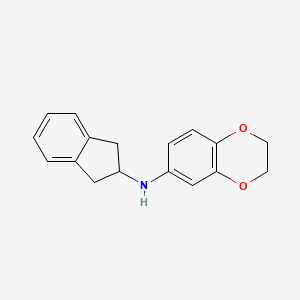 molecular formula C17H17NO2 B7879338 N-2,3-Dihydro-benzo[1,4]dioxin-6-yl-N-indan-2-ylamine 